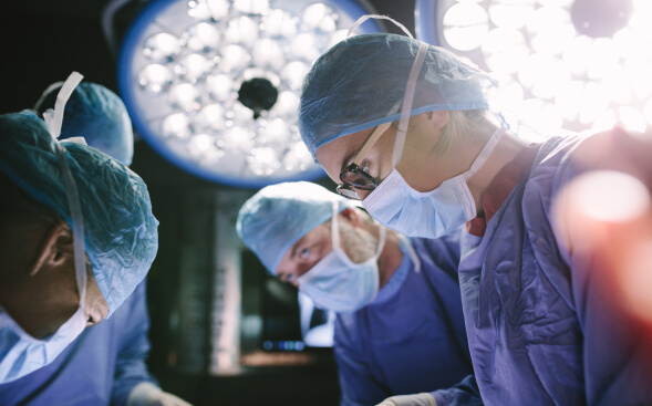 healthcare professionals working in operating room